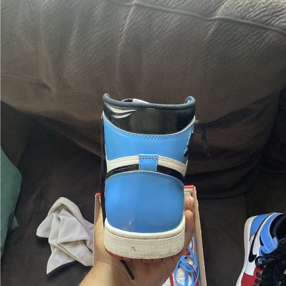 “Out with the old in with the New Savings

Air Jordan 1 From Chi to UNC - Picture 6 of 16